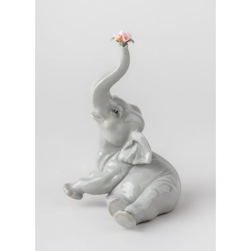 Lladro Baby Elephant with Pink Flower Figurine SKU: 01008491